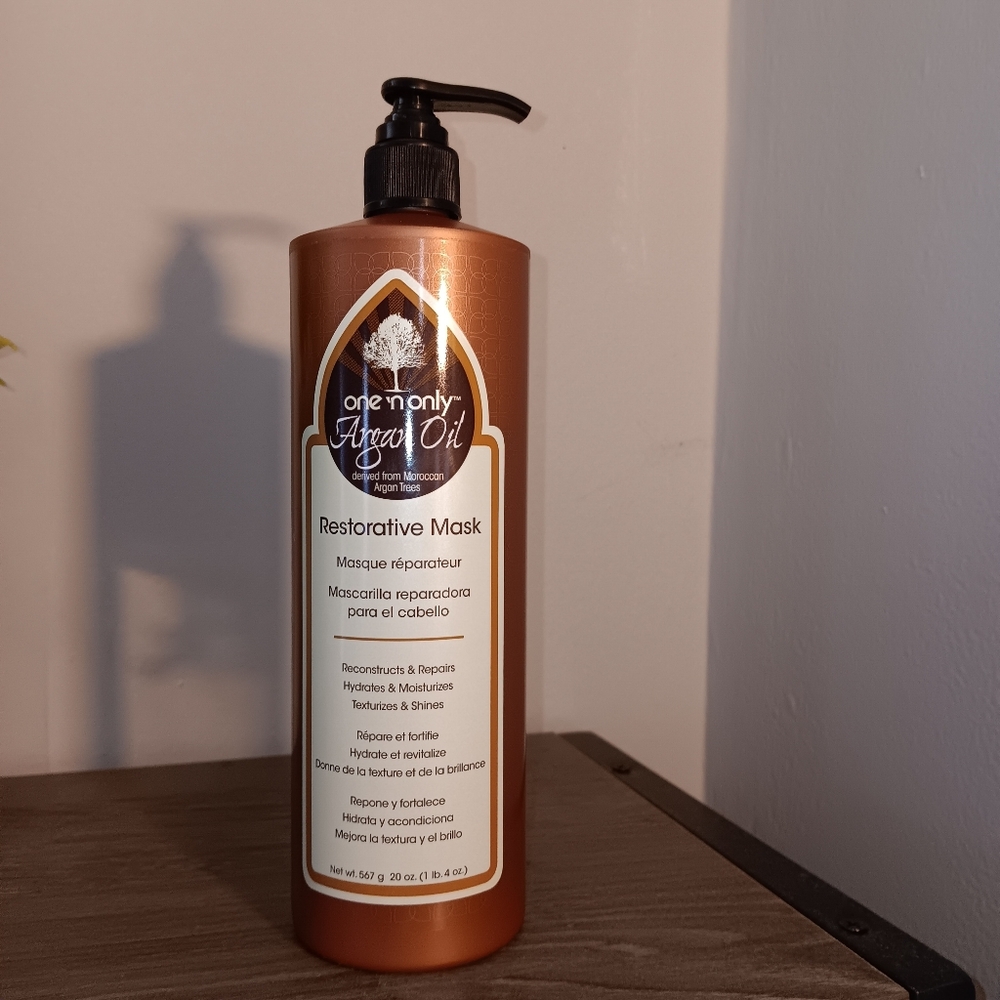 One N Only Argan Oil Restorative Hair Mask, 20 Oz pump bottle.